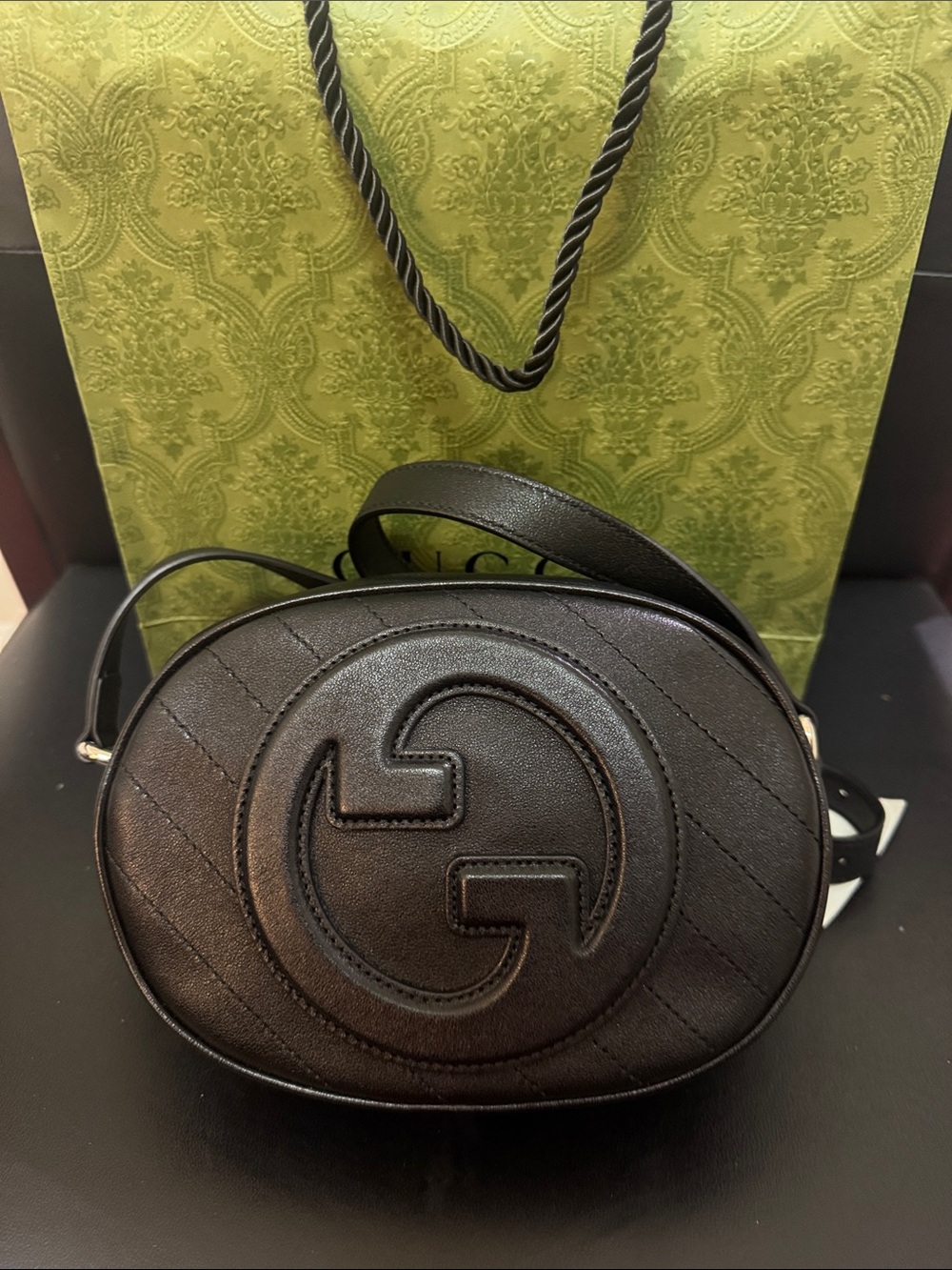 Gucci Black Oval GG Embossed Leather Crossbody Bag